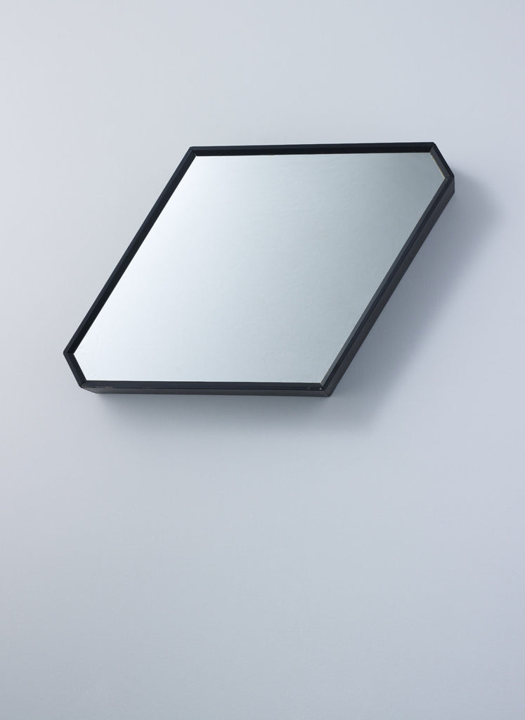 Rhombus shaped mirror